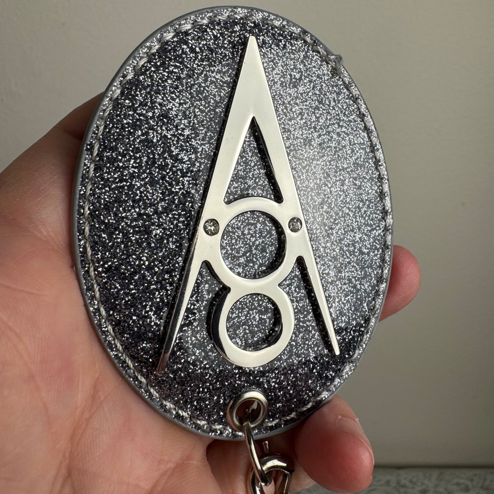Atomic V8 Silver Lux de Ville Bag Charm Keychain Zipper pull Logo Glitter Oval